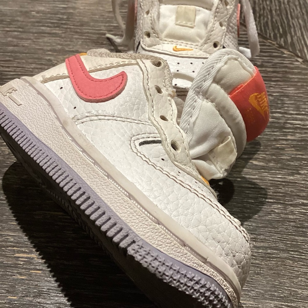 Nike Kids White High-Top Sneakers with Pink Swoosh and Orange Heel Tab